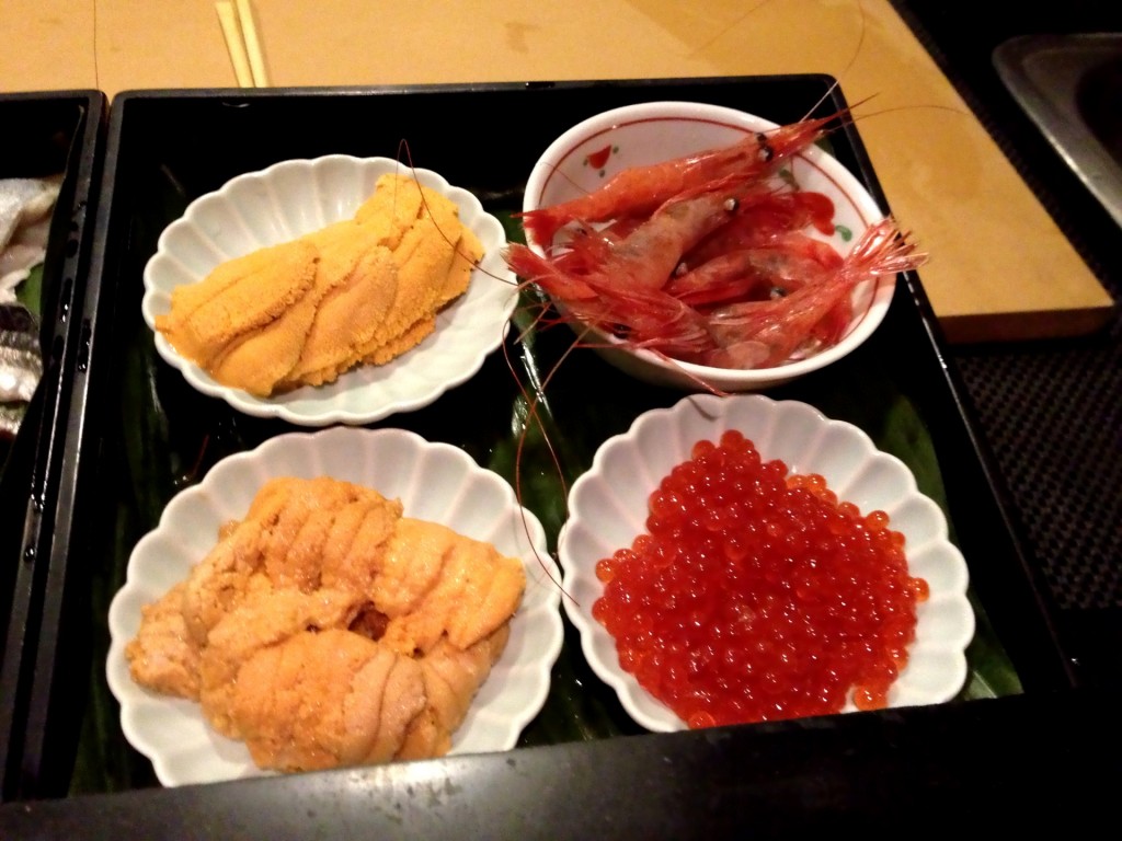 Clockwise from Bottom Left:  Maine Uni (Sea Urchin), Santa Barbara Uni, Amaebi (Sweet Shrimp), and Ikura (Salmon Roe) @ Sushi Taro (© 2013 The Offalo)