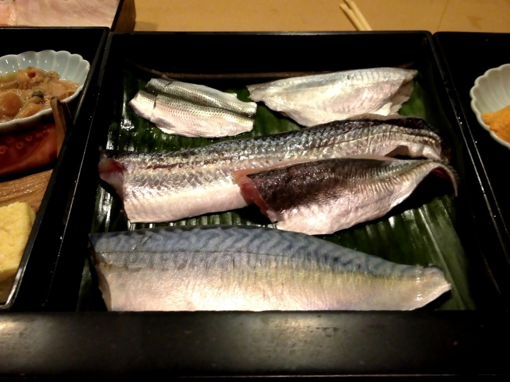 Top: Kohada (Gizzard Shad), Ebodai (Butterfish); Center:  Tobiuo (Flying Fish), Aji (Horse Mackerel); Bottom:  Saba (Atlantic Mackerel) @ Sushi Taro (© 2013 The Offalo)